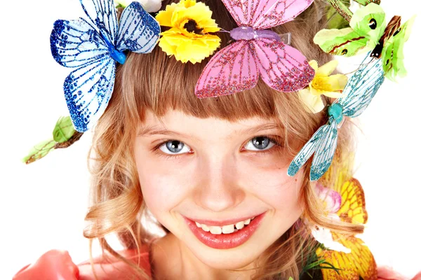 Flicka med fjäril och blomma — Stockfoto