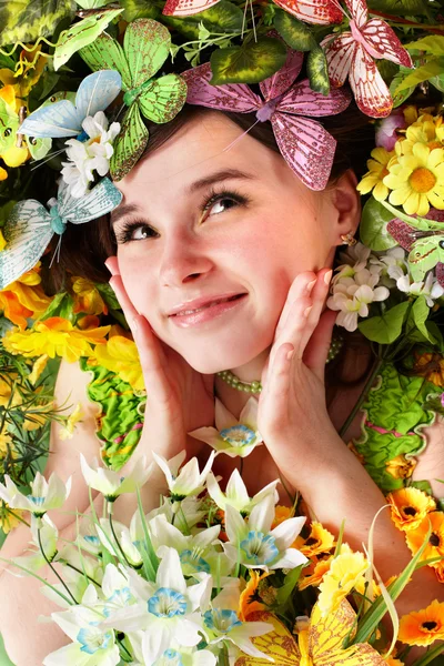 Beautiful girl with butterfly and flower — Stock Photo, Image