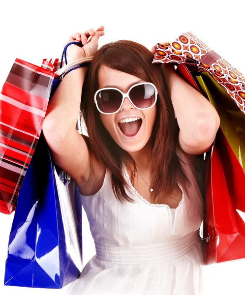 Dívka v bílém brýle s nákupní taškou — Stock fotografie