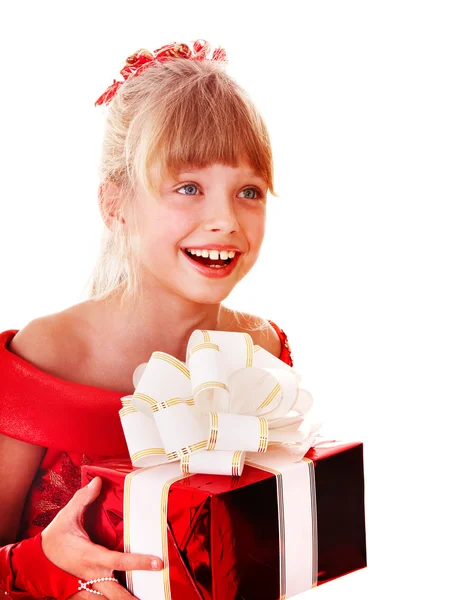 Girl child in red dress with gift box. Royalty Free Stock Photos