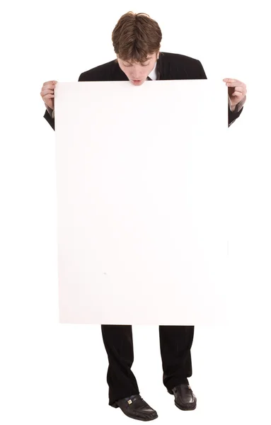 Affärsman med banner utseende — Stockfoto