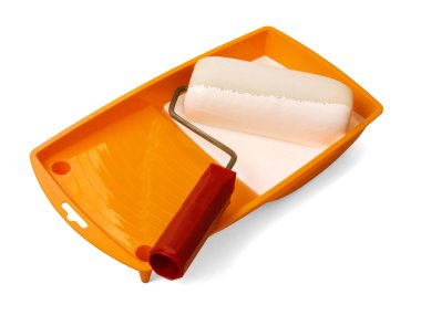 Paint roller in tray of paint clipart