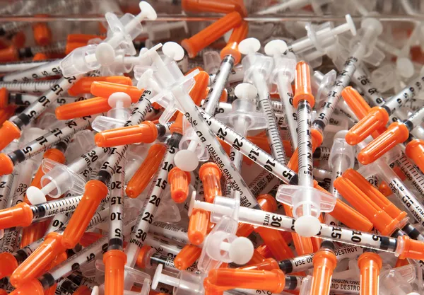 Pile of used syringes — Stock Photo, Image