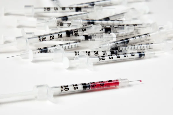 Pile of used syringes with a single fill — Stok fotoğraf