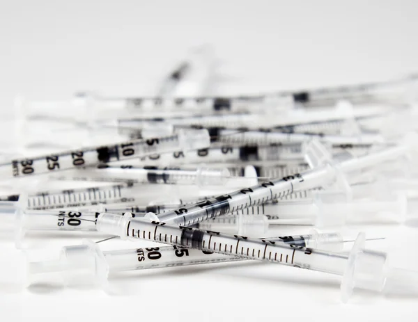 Pile of used syringes — Stock Photo, Image