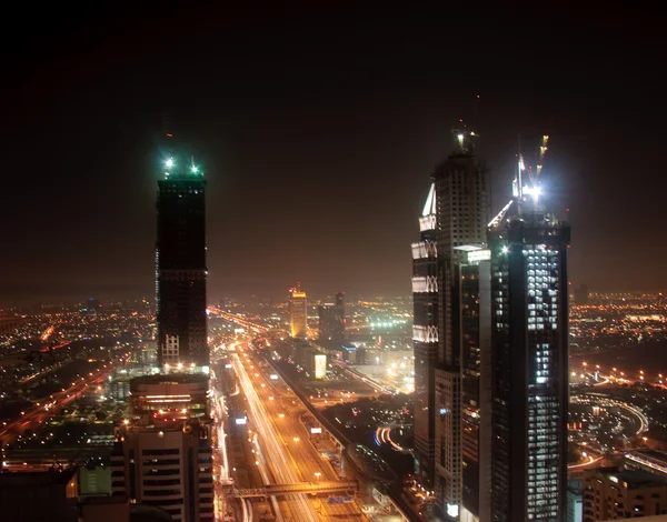 Cityscape of Dubai at night — Stock Photo, Image