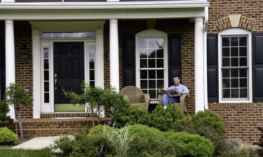 Man relaxed on porch clipart