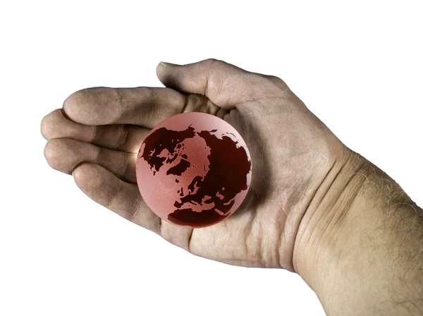 Hand enclosing red globe — Stock Photo, Image