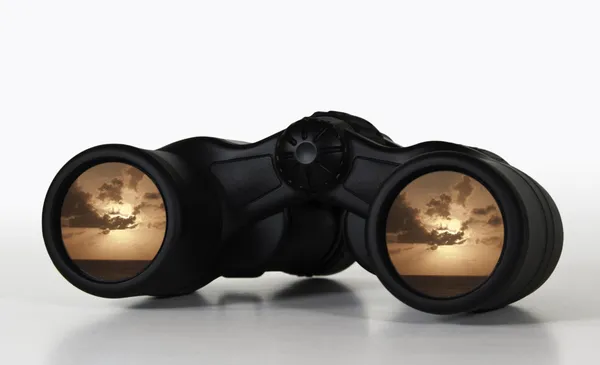 Binoculars with rosy sunset view — Stock Photo, Image