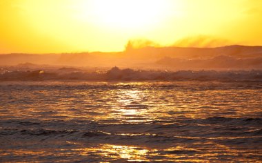 Orange sunset over Na Pali clipart