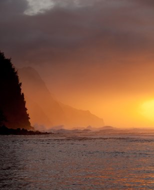 Orange sunset over Na Pali clipart