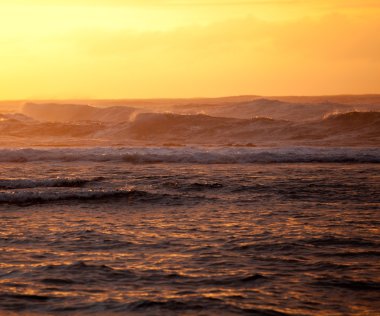 Orange sunset over Na Pali clipart