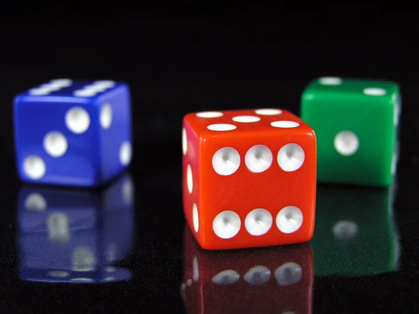 Red, green, and blue dice — Stock Photo, Image