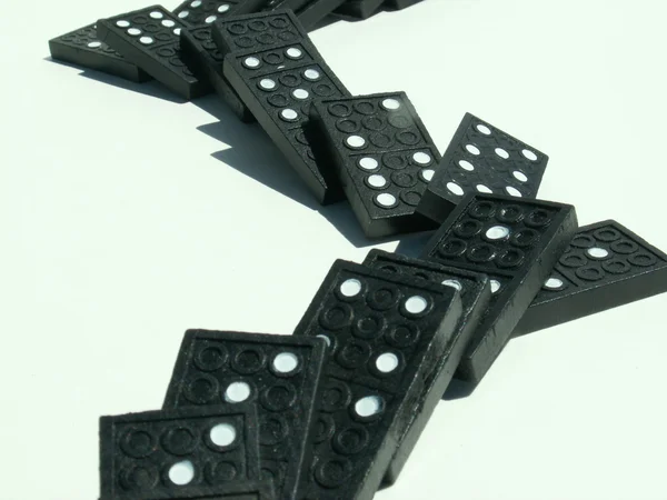 Dominoes falling — Stock Photo, Image