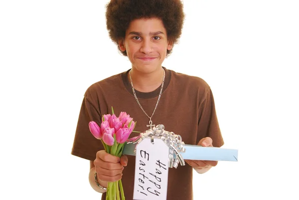 Teenager holding a present — Stock Photo, Image