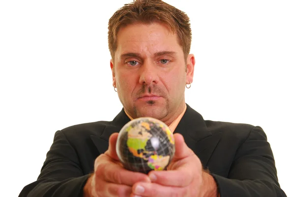 Homem olhando para o globo — Fotografia de Stock