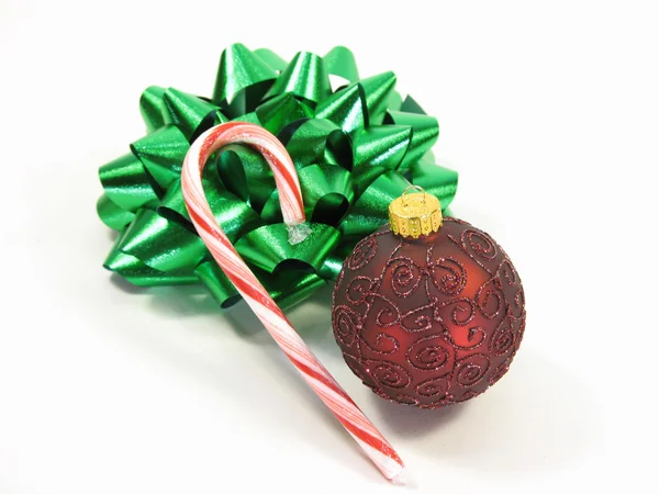 Bow, cane, and ornament — Stock Photo, Image