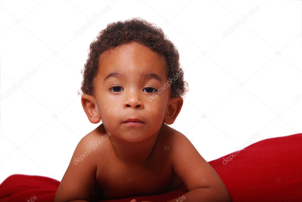 Multi-racial baby wrapped in a blanket