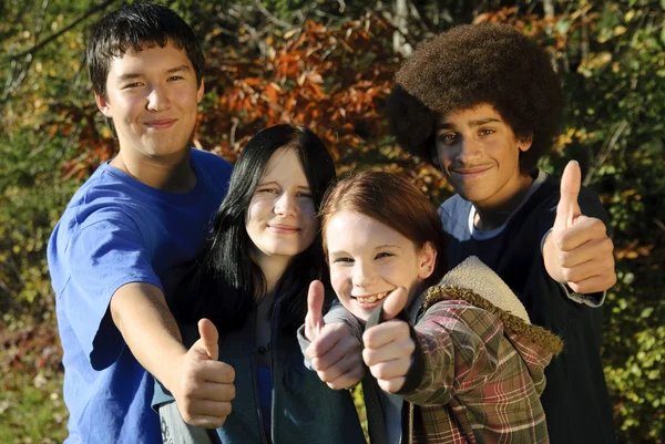 Ethnic teen thumbs up — Stock Photo, Image