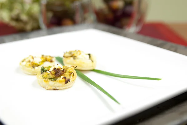 Elegant appetizers with chives — Stock Photo, Image