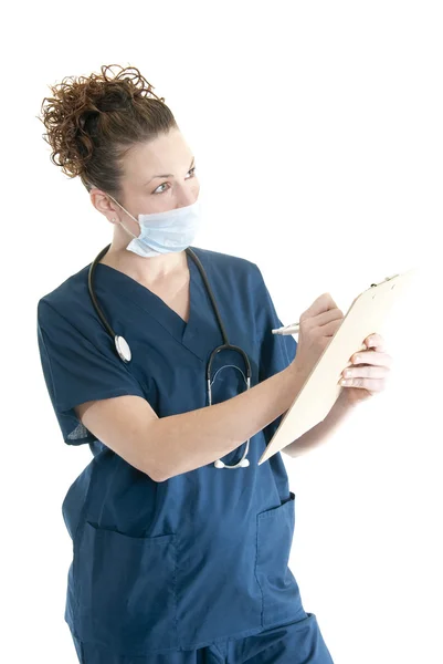 Krankenschwester macht sich Notizen — Stockfoto