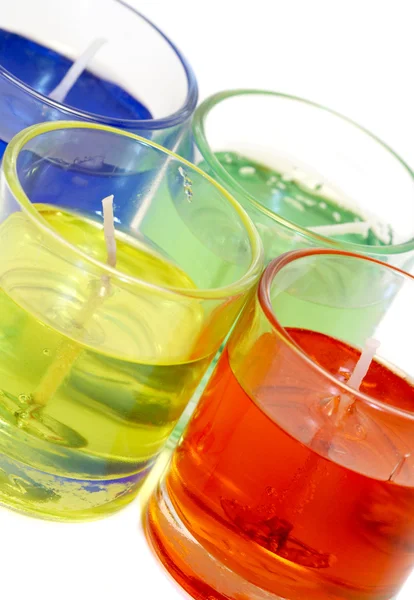 stock image Colour candles in glass glasses