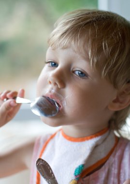 Child eating clipart