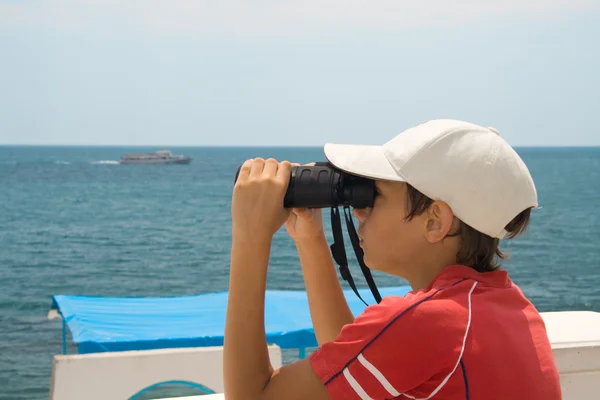 Dítě s dalekohledem — Stock fotografie