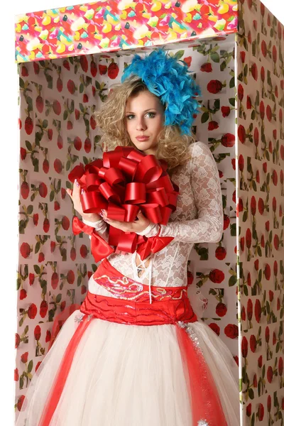 The doll in a gift box. — Stock Photo, Image