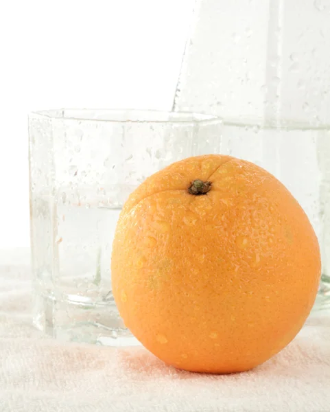 Glass, bottle and orange — Stock Photo, Image