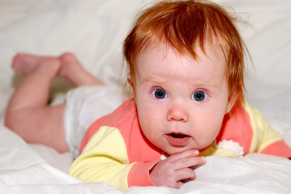 Baby with wide open eyes — Stock Photo, Image