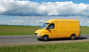 Yellow delivery truck clipart