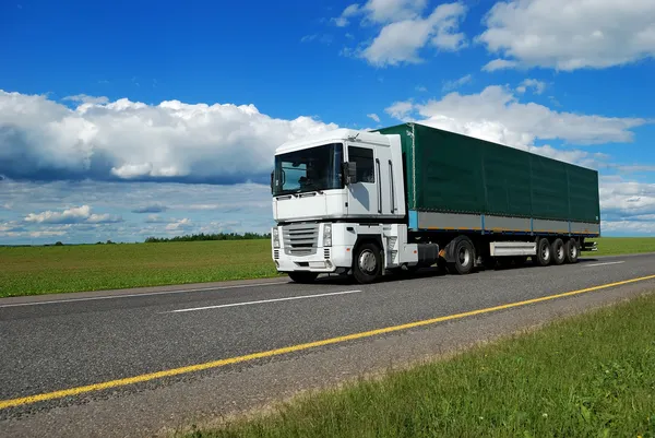 White lorry with green trailer — Stock Photo, Image