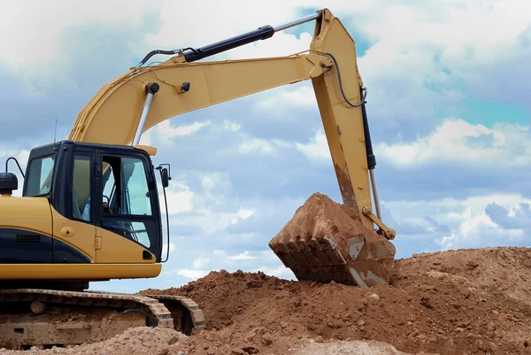 Grävmaskin bulldozer loader i sandlådan — Stockfoto