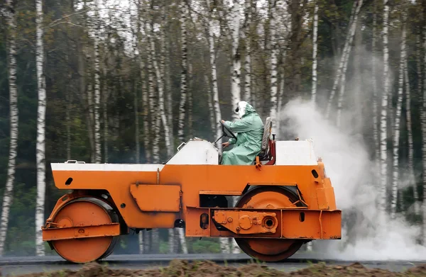 stock image Compactor asphalting the road