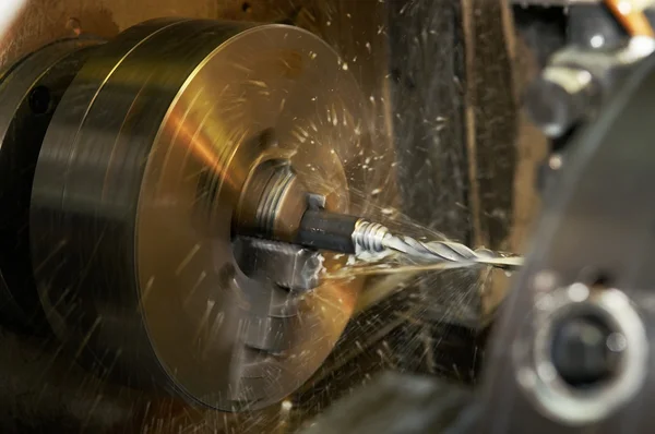 Drilling a hole in blank on turning mach — Stock Photo, Image