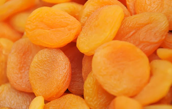 stock image Heap of orange dried apricots