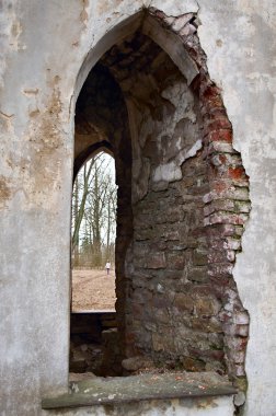 Window opening in brick ancient wall. clipart