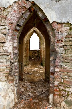 Ancient arches through the brick walls w clipart