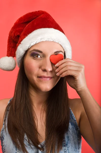 Young beautiful woman with red heart — Stock Photo, Image