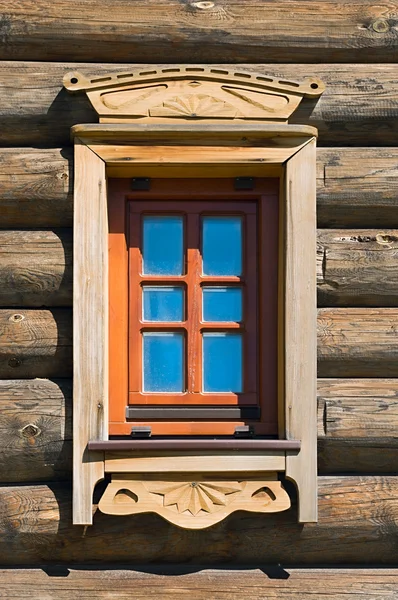 Ancient wooden window in timber wall — Stock Photo, Image