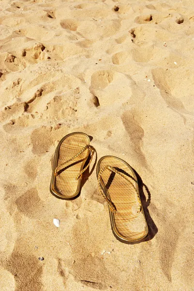 stock image Slippers on the beach