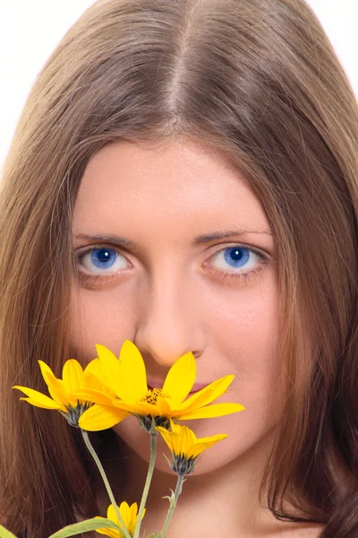 The nice girl with a yellow flower — Stock Photo, Image