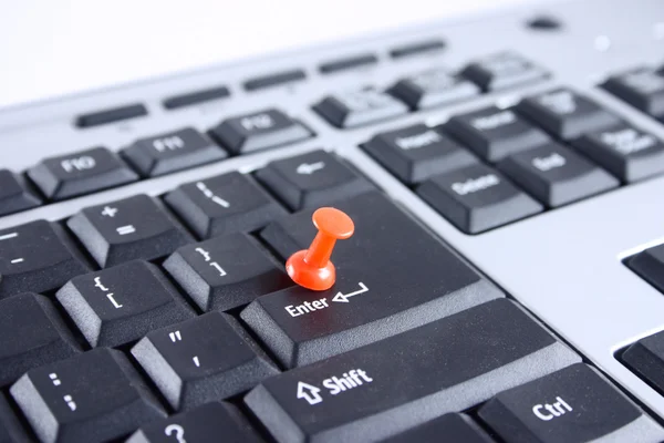 stock image Computer key pinned by a pin