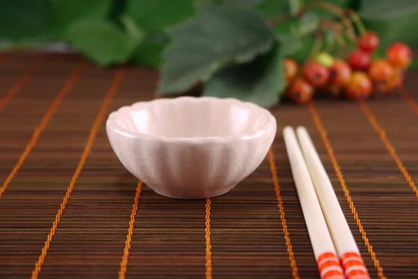 stock image Cup and chopsticks