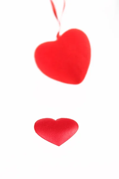Шелковое сердце против подвески — стоковое фото