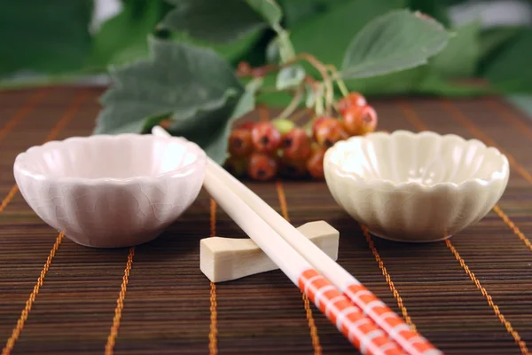 stock image Chopsticks with two drinking bowl