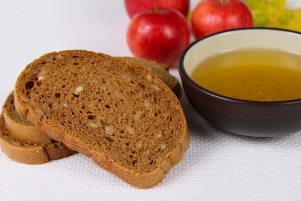Honey with black bread and apples — Stock Photo, Image
