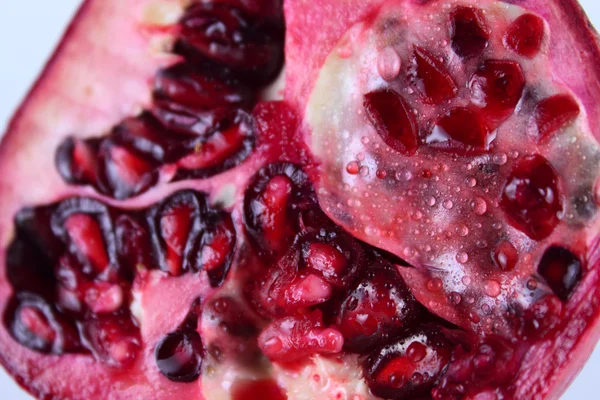 The cut pomegranate — Stock Photo, Image
