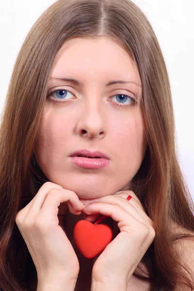 stock image Nice girl having control over toy heart